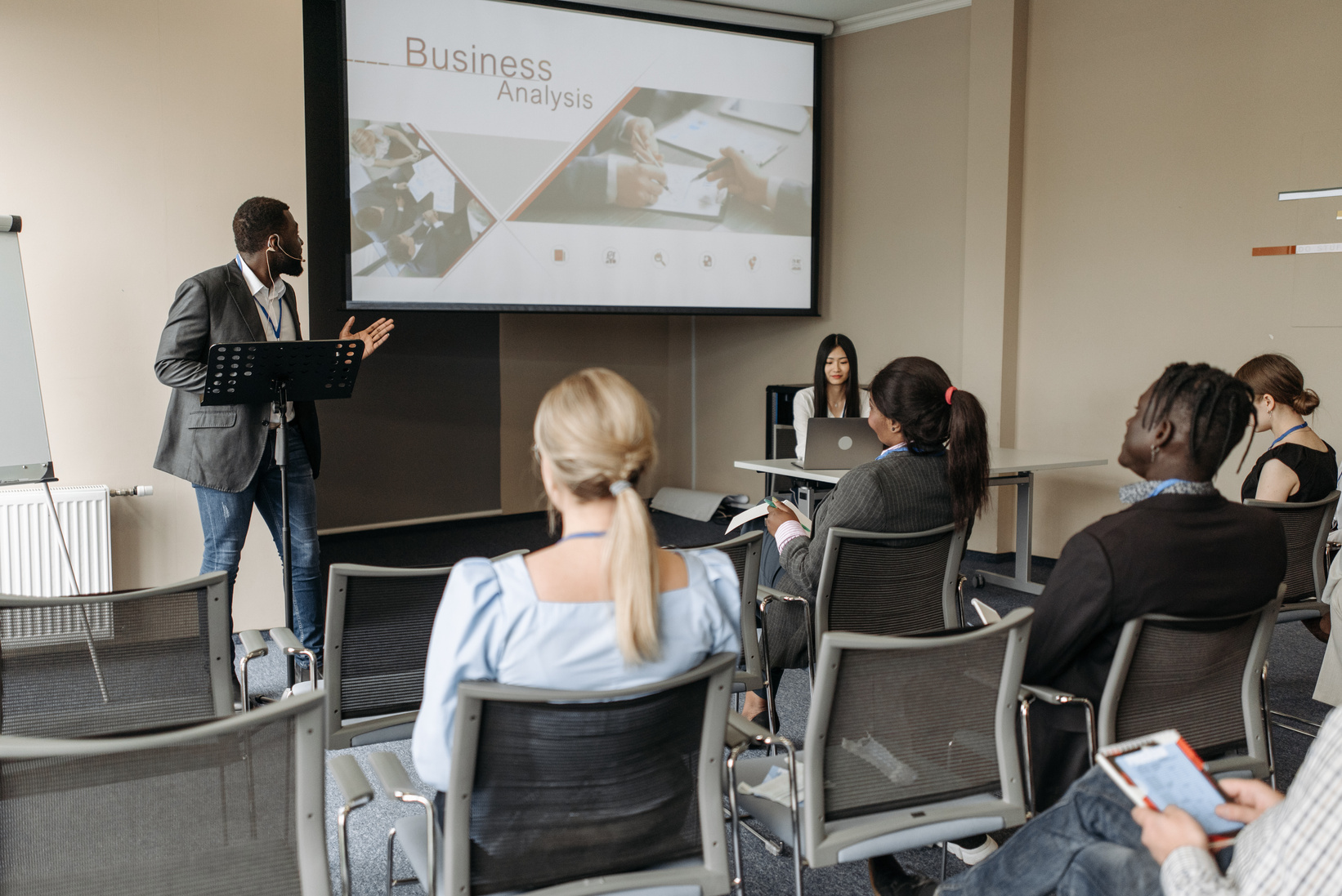 Man in Black Blazer Having a Presentation