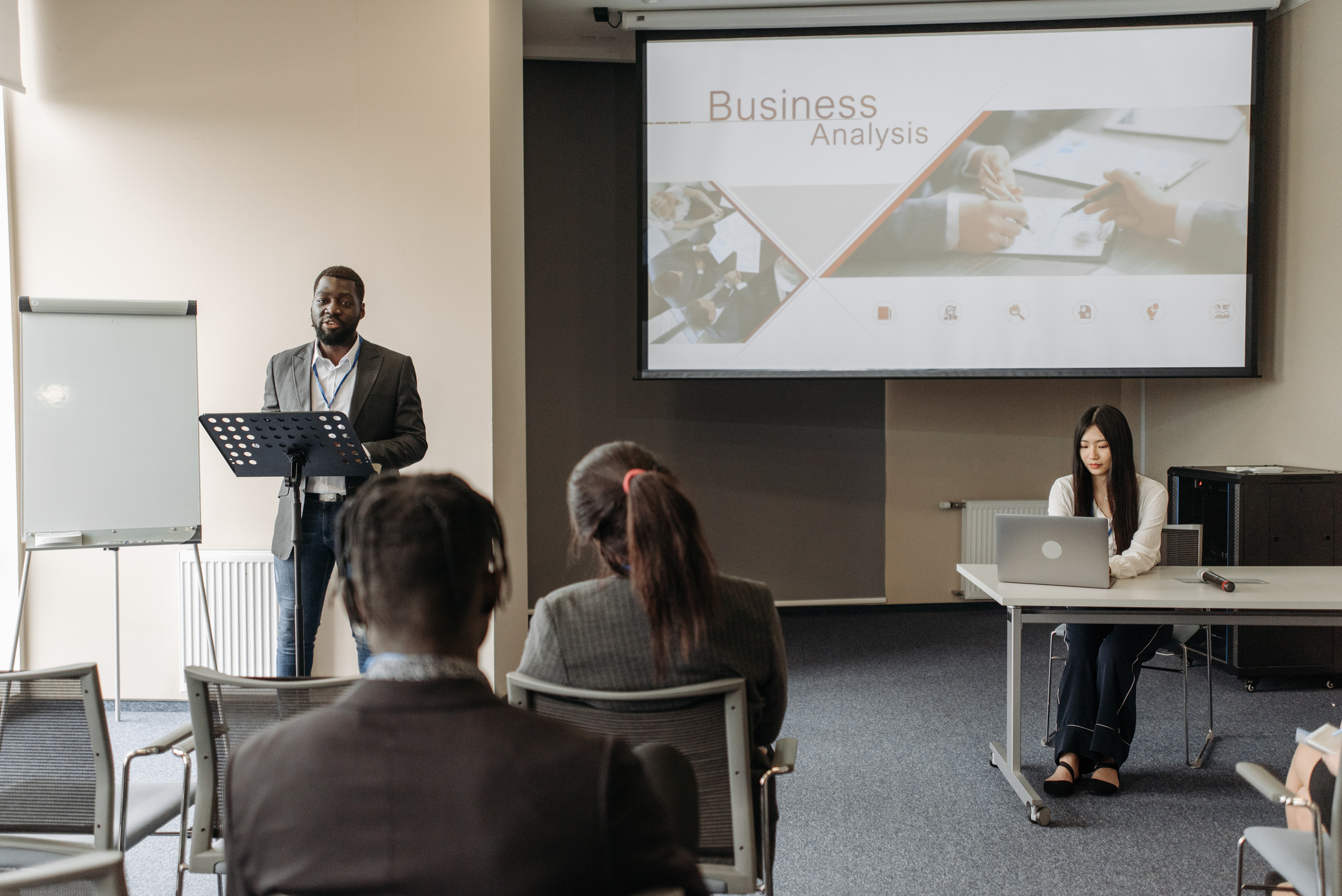 A Man Speaking at a Business Seminar